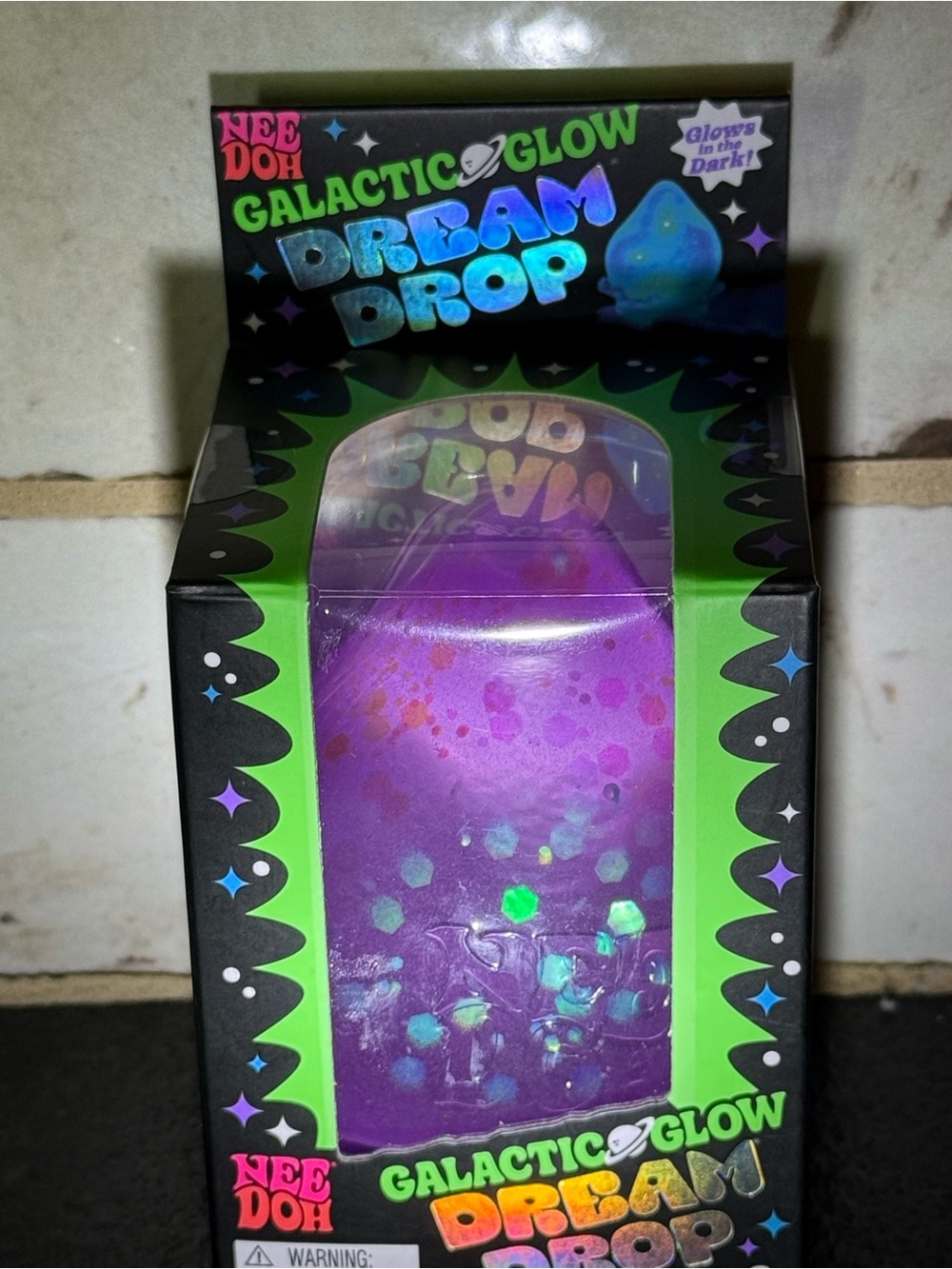 NeeDoh Galactic Glow Dream Drop - Purple Glow in the dark. Glitter Stress Toy